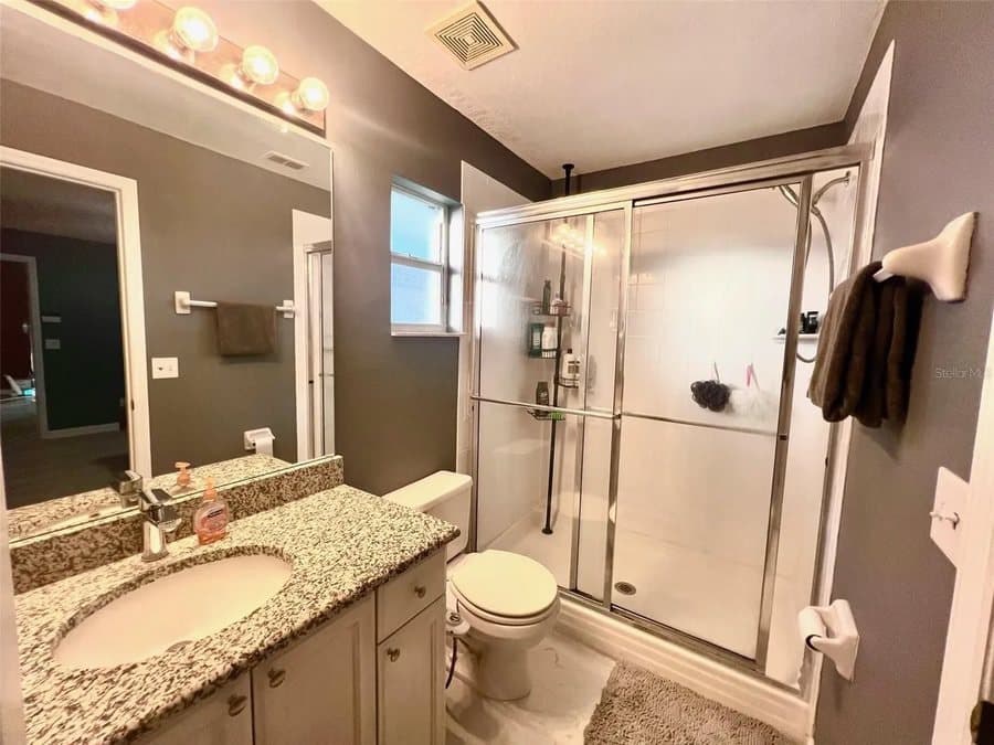 A recent single-family renovation. Primary bath, before renovation.